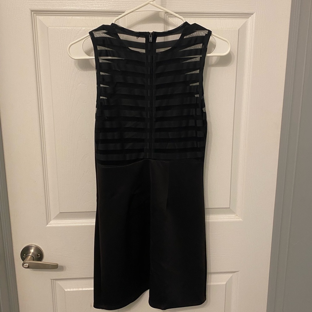 BCBG black mini dress with mesh back